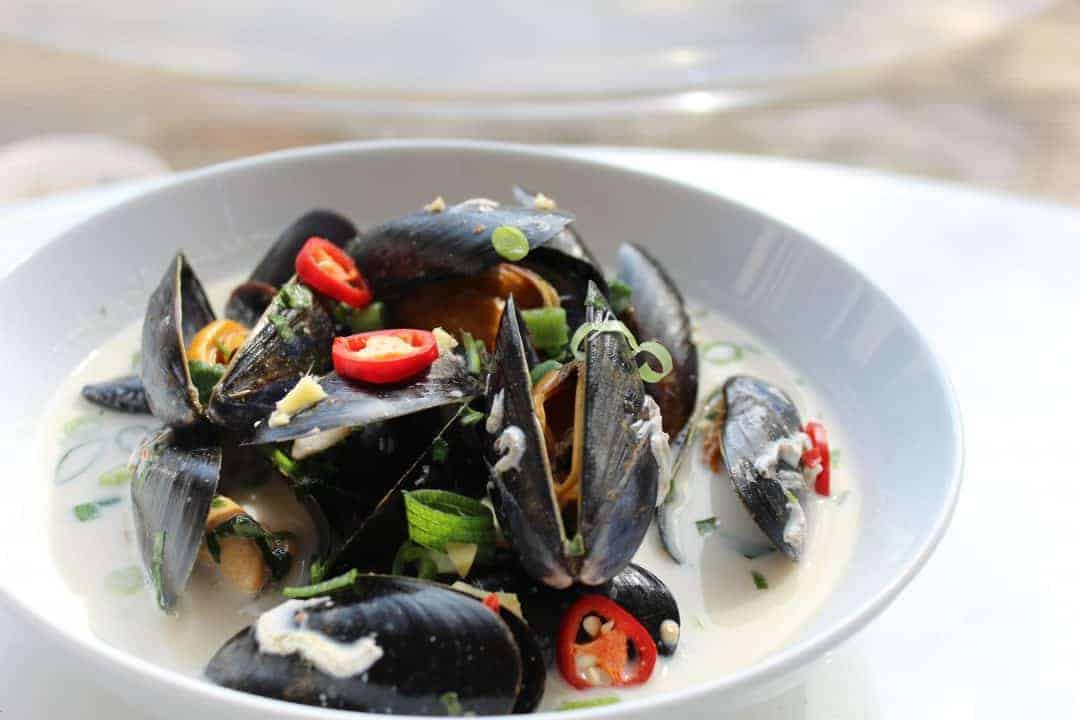 Thai Mussels in a white bowl
