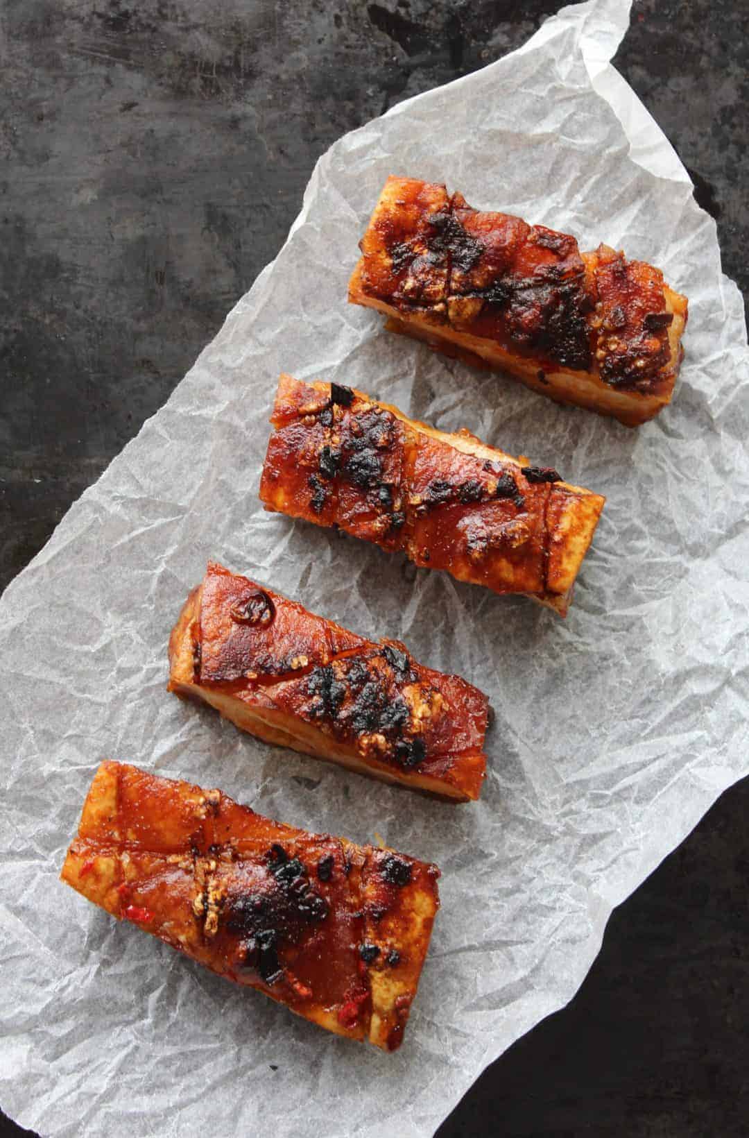 Chilli and Cider Pork Belly slices on parchment