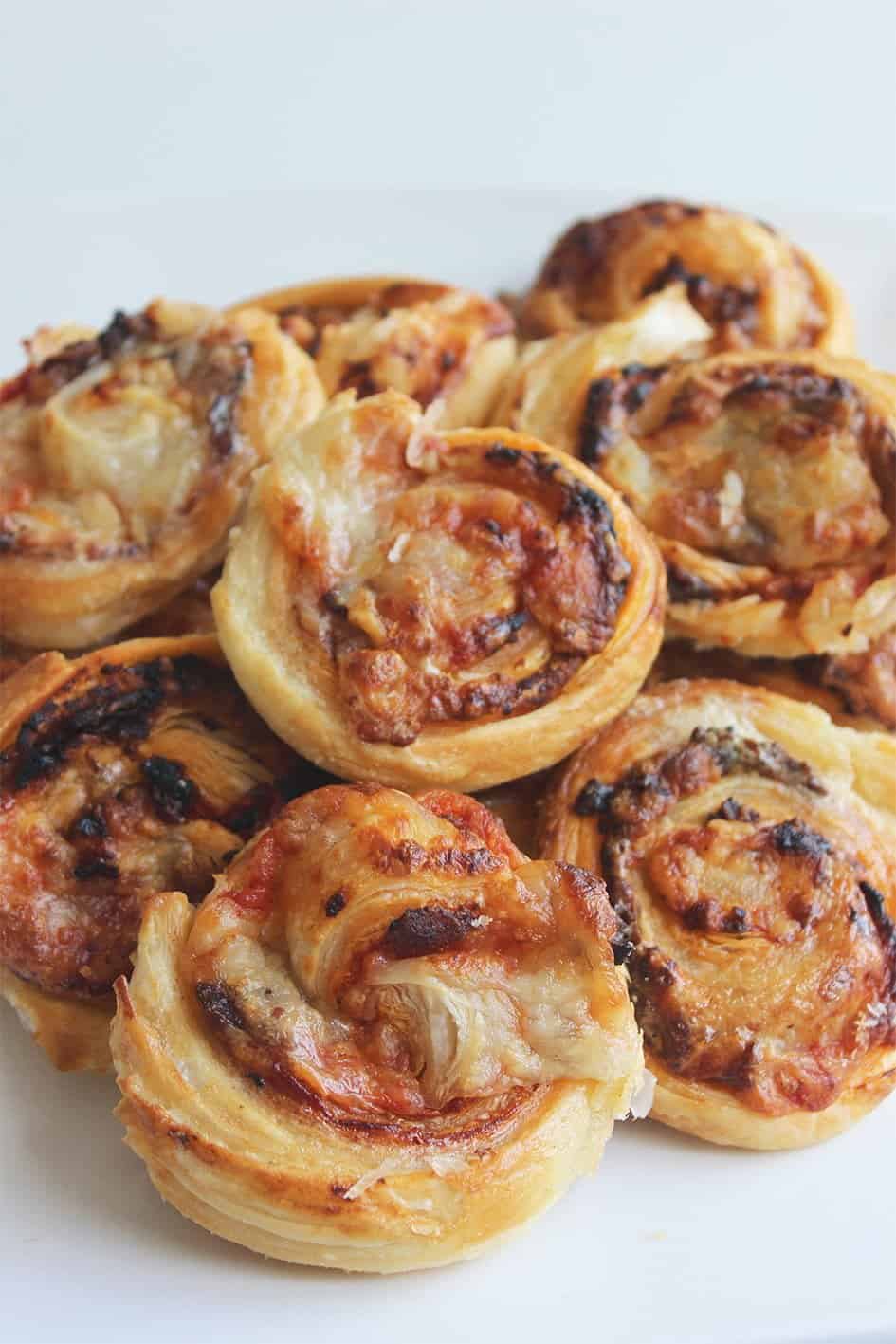 A stack of puff pastry pinwheels