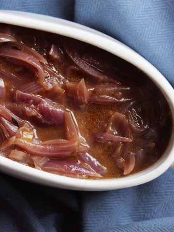 This onion gravy is a perfect accompaniment to bangers and mash, toad in the hole or a Sunday roast. Made from scratch and full of flavour. Vegetarian.
