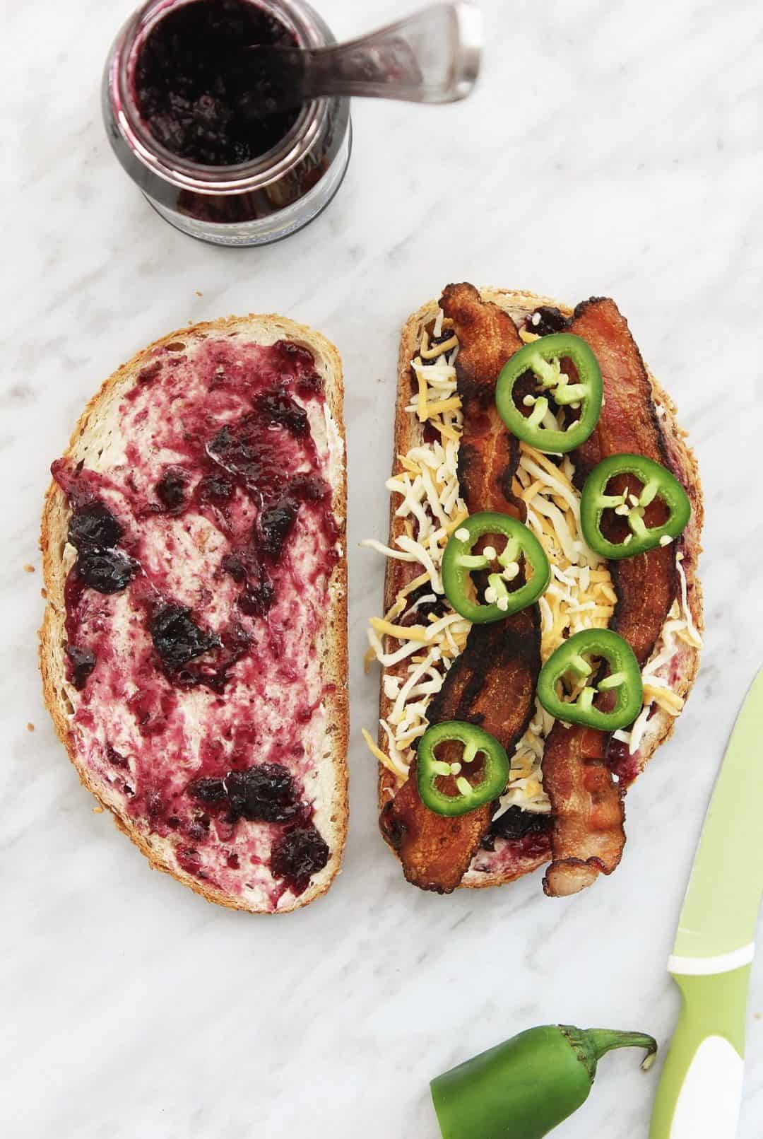 My Hot Berry Blueberry Grilled Cheese is quick and easy to make and super indulgent! Packed with cheese, jalapeno, blueberry and bacon. You can't get a better grilled cheese!! Grilled Cheese| Blueberry Grilled Cheese | Easy Grilled Cheese | Grilled Cheese with Bacon | Bacon and Blueberry | Spicy Grilled Cheese #grilledcheese #grilledcheesesandwich #blueberrygrilledcheese