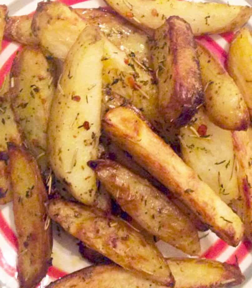 close up of oven baked fries on a plate