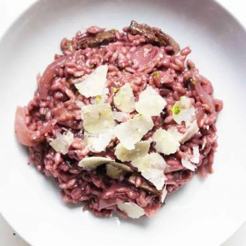 Red Wine Risotto with Steak and Topped With Parmesan