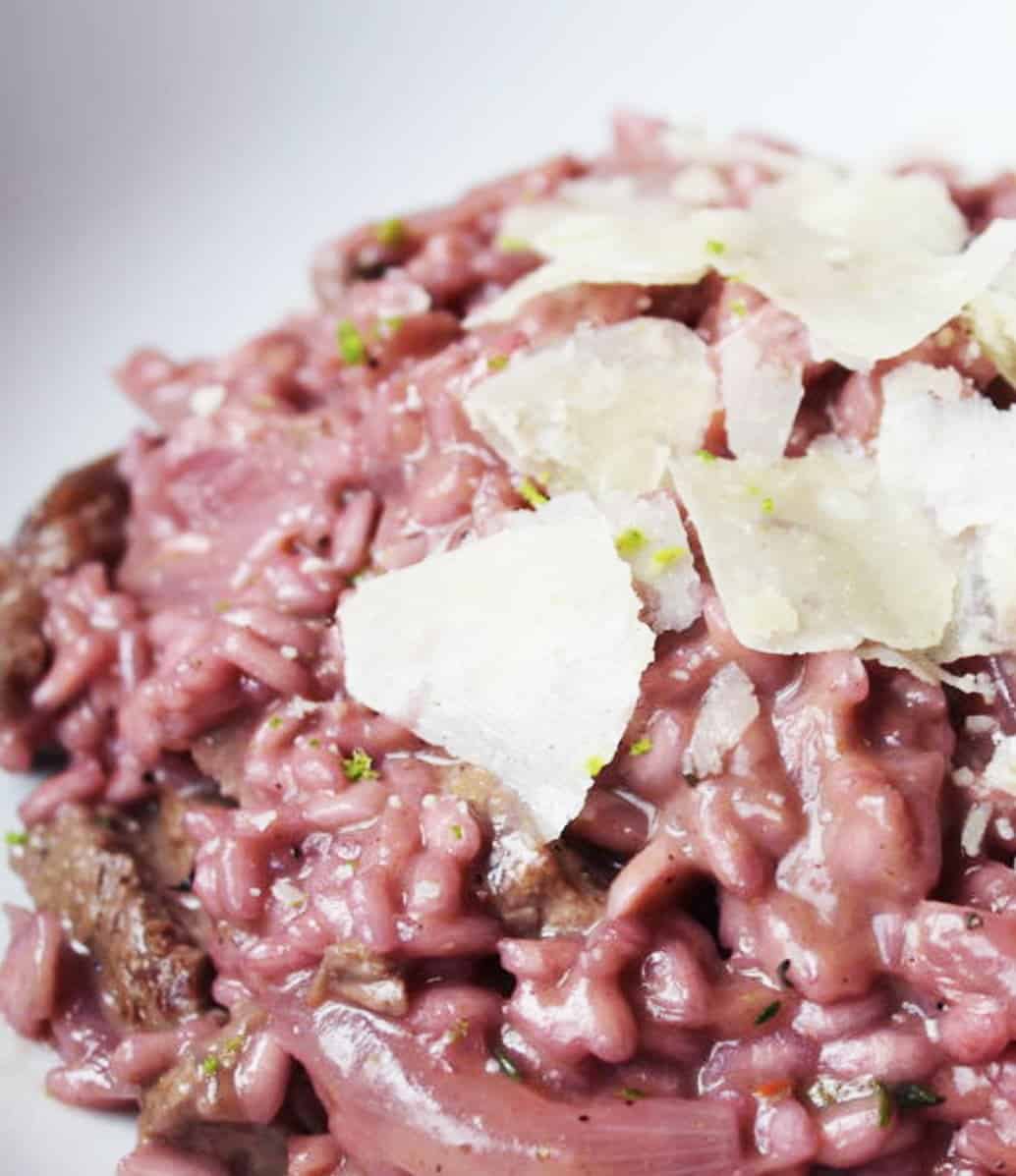 Red Wine Risotto with Steak and Topped With Parmesan