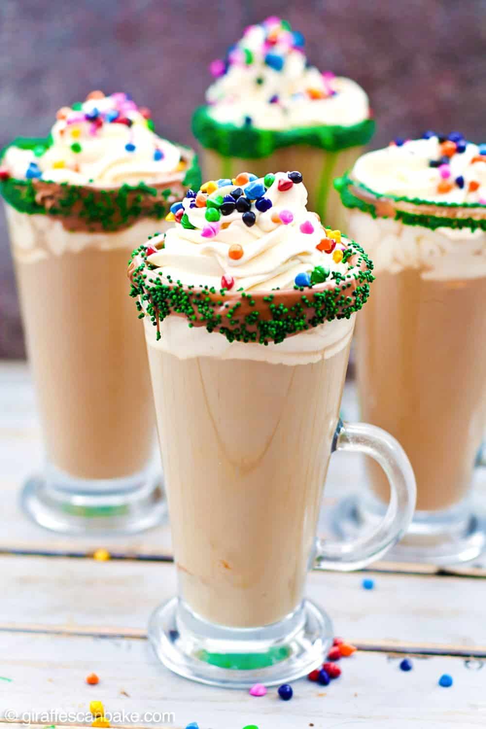 Four glasses of Mint Irish Latte decorated with sprinkles