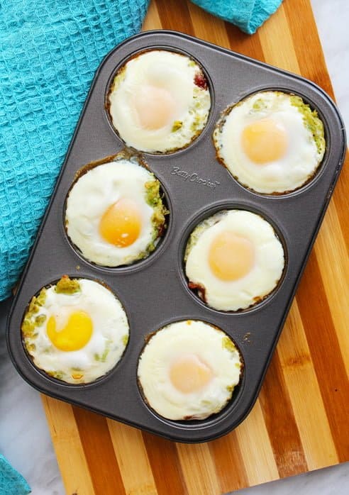 Bacon and egg cups in a muffin pan straight out of the oven