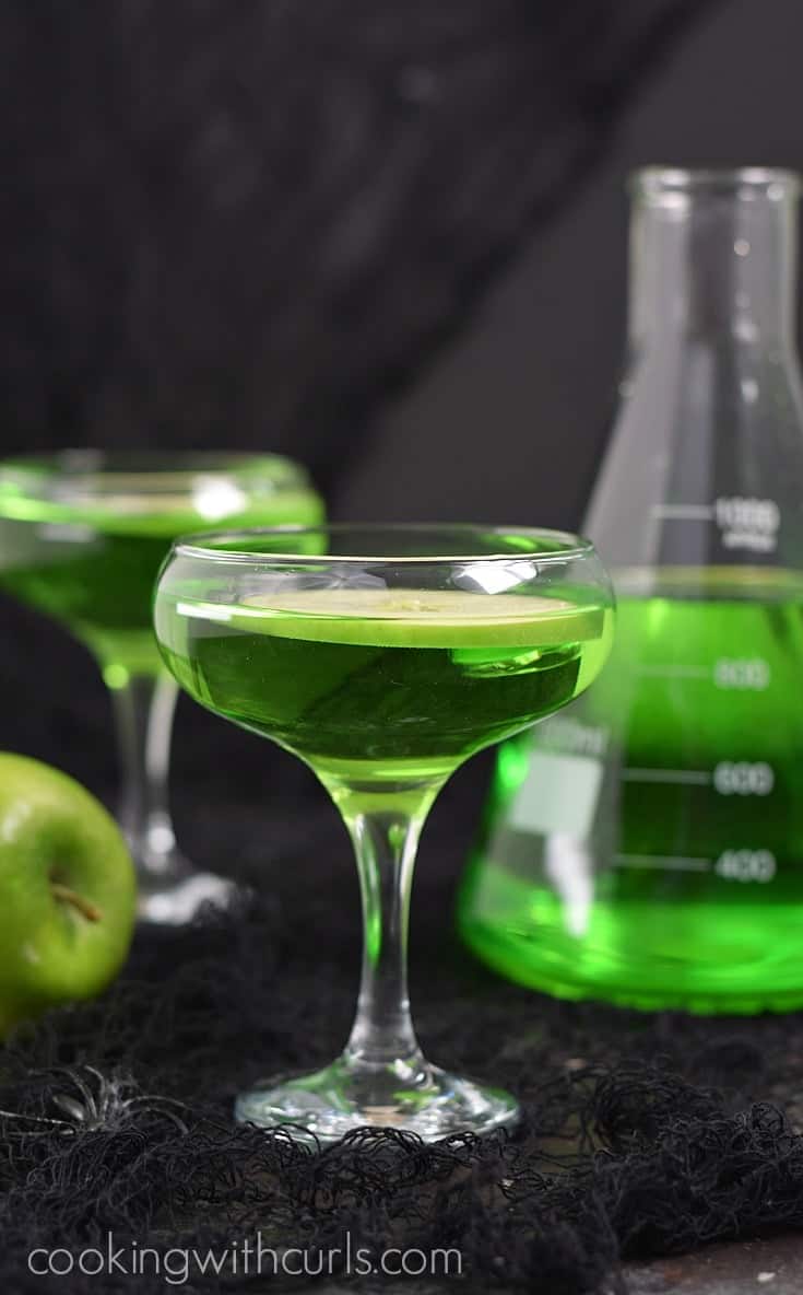 A poisoned apple cocktail in a shallow cocktail glass