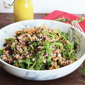 Brown rice salad in a large serving bowl