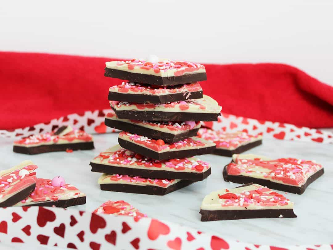 Chocolate bark stacked with red heart ribbon
