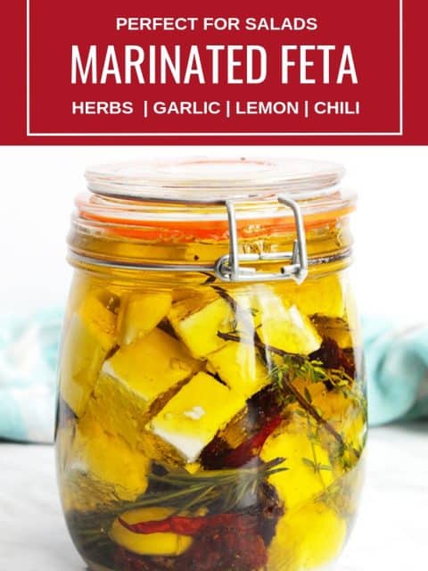 Pinterest image. Marinated feta in a glass jar with text overlay