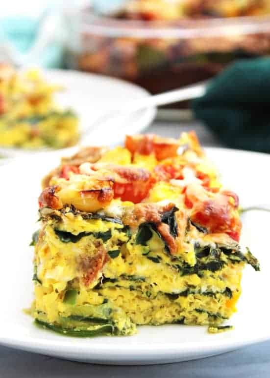 Side view of a layered sausage egg bake.