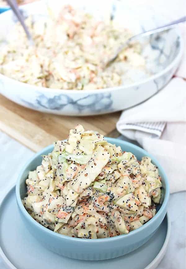 Fennel apple coleslaw in a small blue bowl