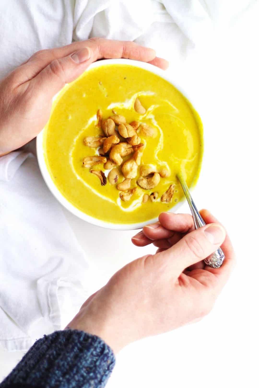 coconut and cauliflower soup in a white bowl