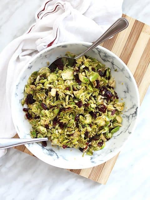 Top shot of Sauteed Brussels Sprouts with Cranberries in a large serving bowl