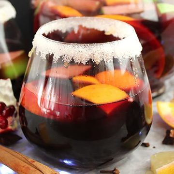 Close up of a sugar rimmed glass of red wine sangria