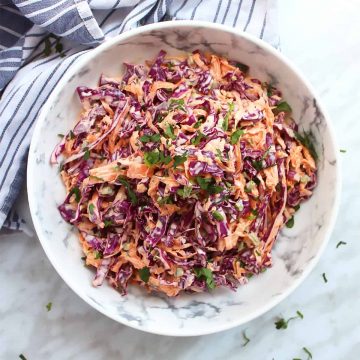 Red cabbage slaw in a large bowl