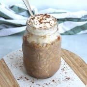 Chocolate and peanut butter overnight oats in a glass jar.