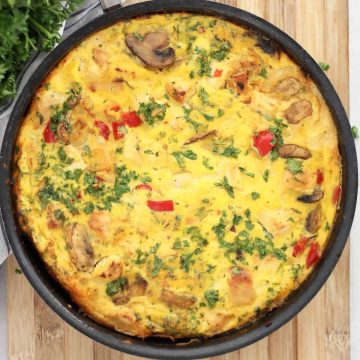 Overhead shot of a chicken frittata in a skillet.