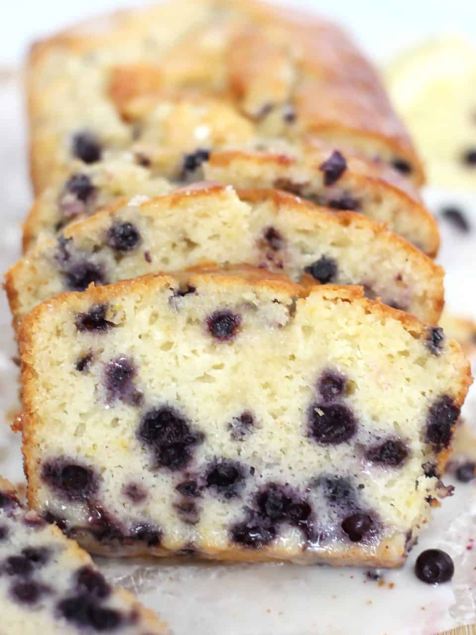 Lemon and blueberry pound cake cut into slices.