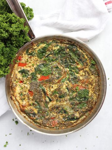 Vegetable and egg white frittata in a silver skillet.