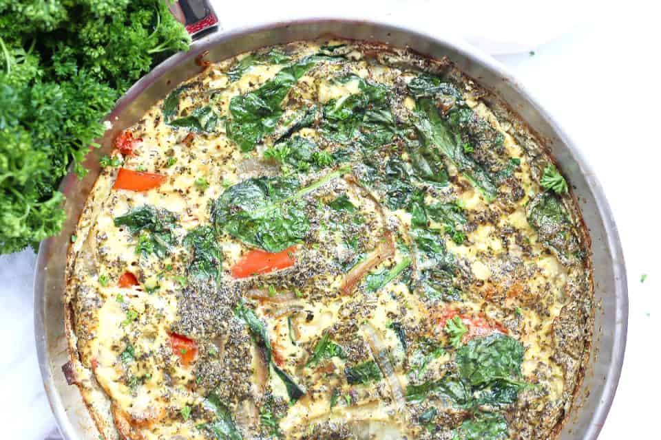 Herb and egg white frittata baked in a skillet.