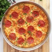 Pepperoni pizza frittata in a silver skillet.