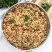 Ground turkey fried rice in a silver skillet.