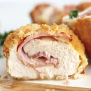 Close up of chicken cordon bleu cut in half to see the ham and cheese.