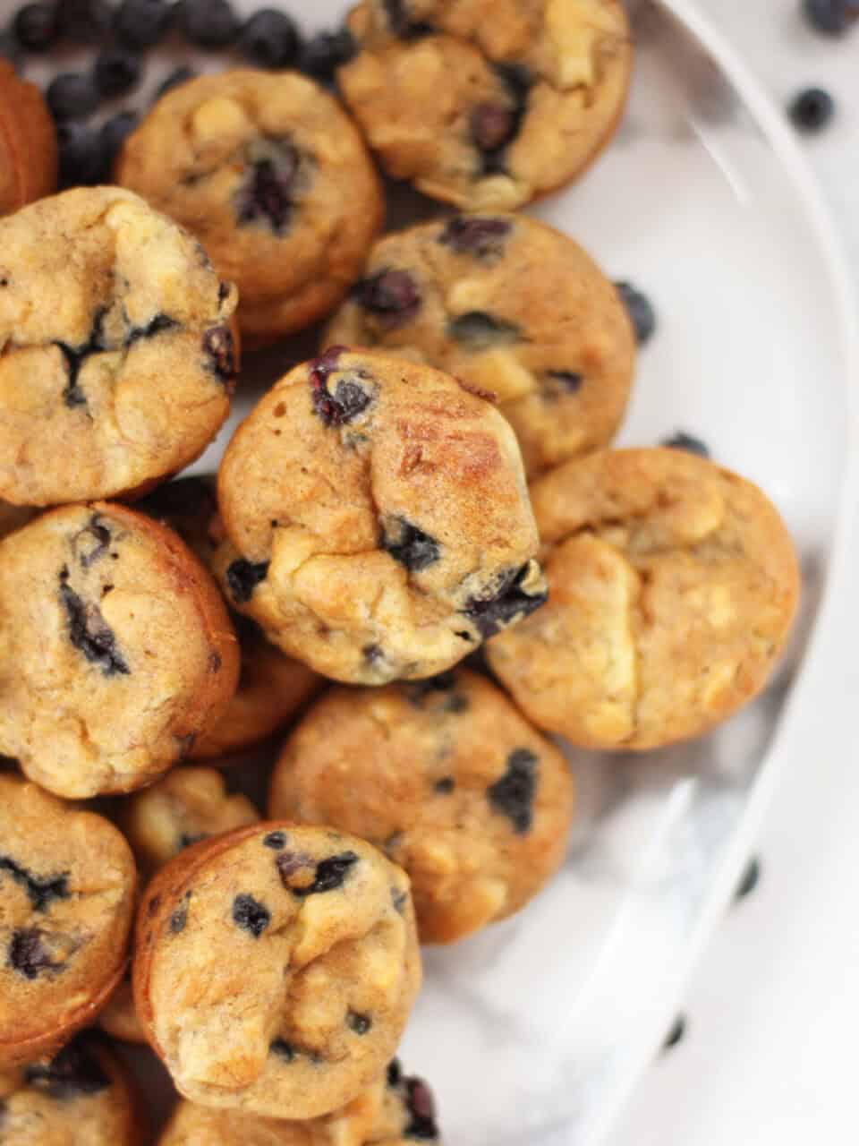 Whole blueberries in mini muffins.