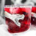 Bubbly red Halloween punch in a glass.