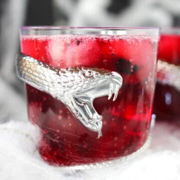 Bubbly red Halloween punch in a glass.