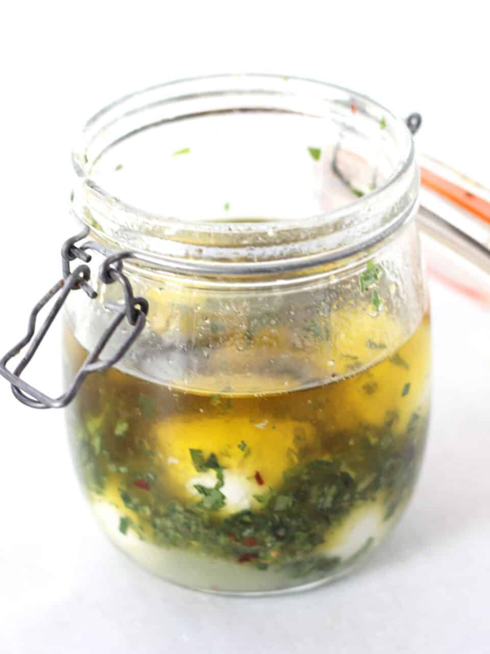 Bocconcini balls in an oil marinade.