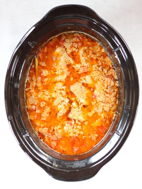 The curry in the Crockpot once it is cooked.