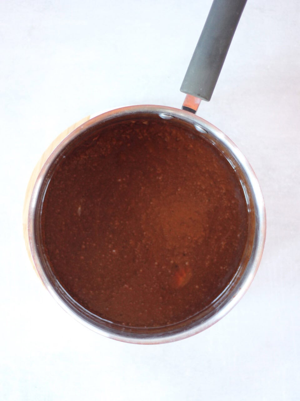 Smooth chocolate mixture in a pot,