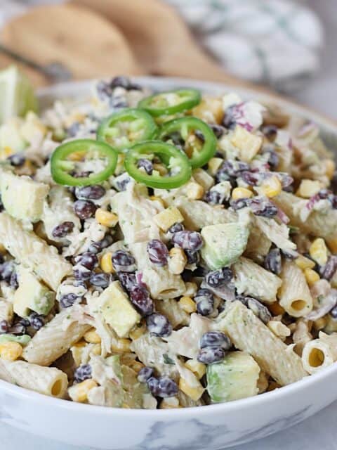 Black beans, corn and avocado in a creamy pasta salad.